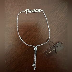 HENRI BENDEL PEACE SLIDER BRACELET SILVER NWT